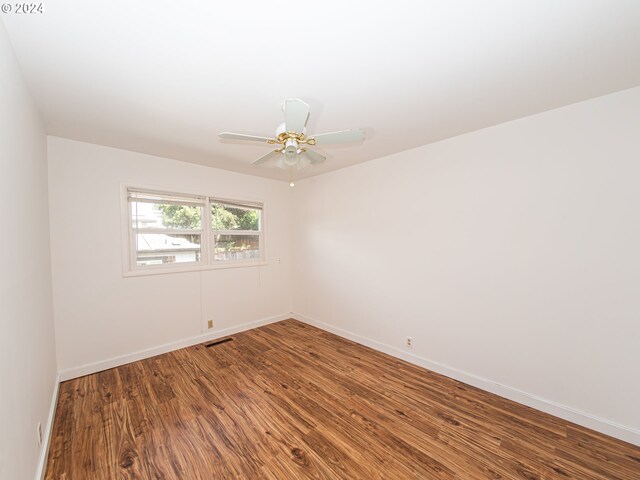 51055109 SE Tibbetts St, Portland, OR 97206 - spare room with wood finished floors, baseboards, and ceiling fan
