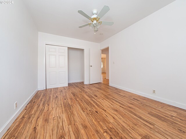 51055109 SE Tibbetts St, Portland, OR 97206 - unfurnished bedroom featuring light wood-style flooring, baseboards, a closet, and ceiling fan
