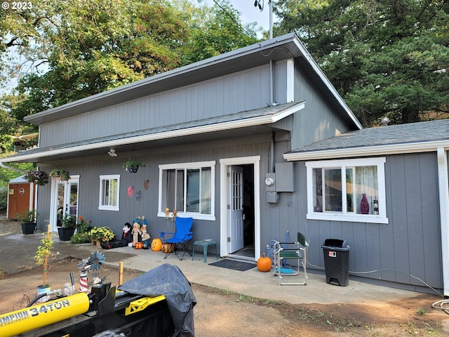 130 Aker Dr, Myrtle Creek, OR 97457 - view of front of property with a patio area and roof with shingles