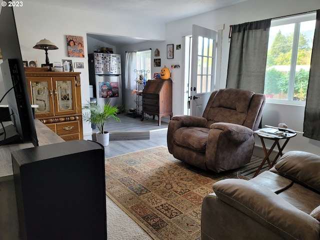 130 Aker Dr, Myrtle Creek, OR 97457 - living area with plenty of natural light and light wood-style floors