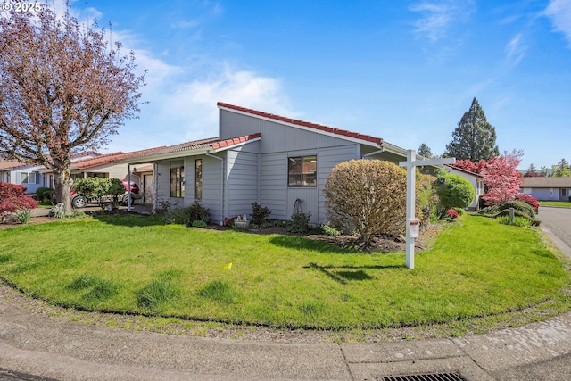 1616 N Johnson Dr, Newberg, OR 97132 - view of front of property featuring a front lawn and a tile roof