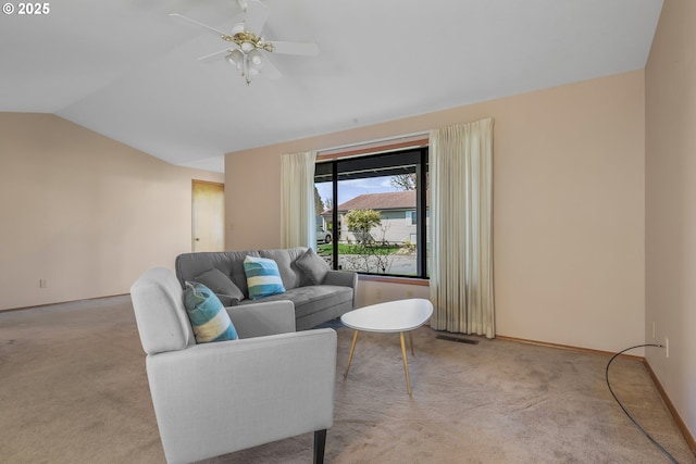 1616 N Johnson Dr, Newberg, OR 97132 - living room with light colored carpet, ceiling fan, vaulted ceiling, and baseboards