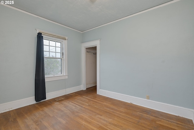 5417 NE 15th Ave, Portland, OR 97211 - unfurnished bedroom featuring ornamental molding and wood finished floors
