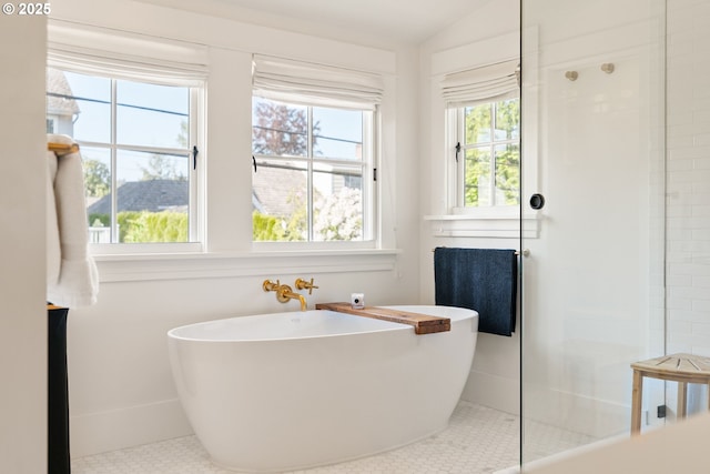 7985 SW Maple Dr, Portland, OR 97225 - bathroom with a freestanding bath, a shower with shower door, and vaulted ceiling