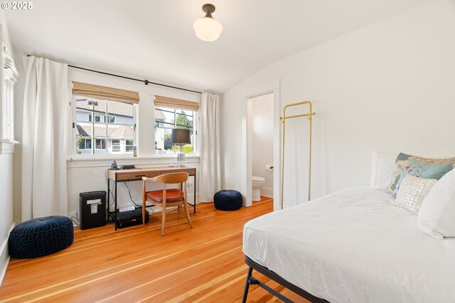 7985 SW Maple Dr, Portland, OR 97225 - bedroom with vaulted ceiling and wood finished floors
