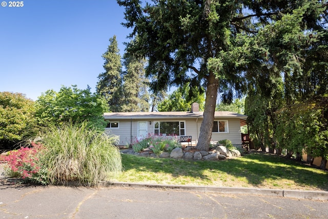 1379 Tucker Rd, Hood River, OR 97031 - single story home featuring a front yard and a chimney