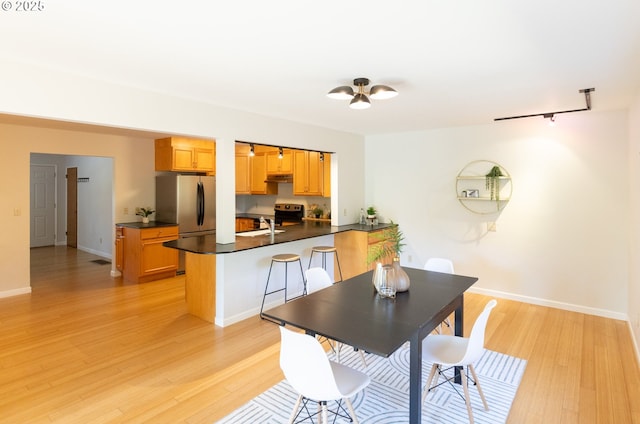 1379 Tucker Rd, Hood River, OR 97031 - dining space featuring light wood-style flooring and baseboards