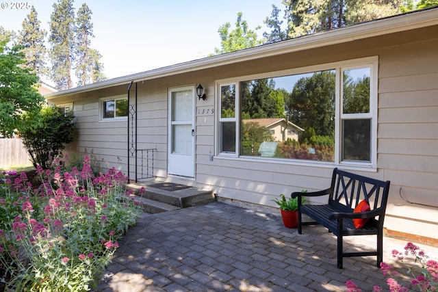 1379 Tucker Rd, Hood River, OR 97031 - view of exterior entry with a patio area