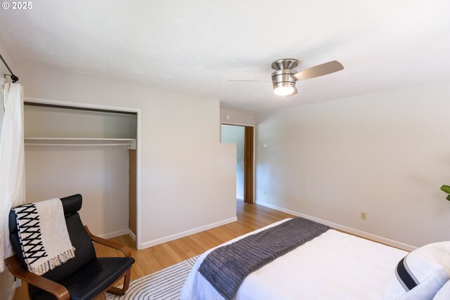 1379 Tucker Rd, Hood River, OR 97031 - bedroom featuring wood finished floors, a closet, baseboards, and ceiling fan