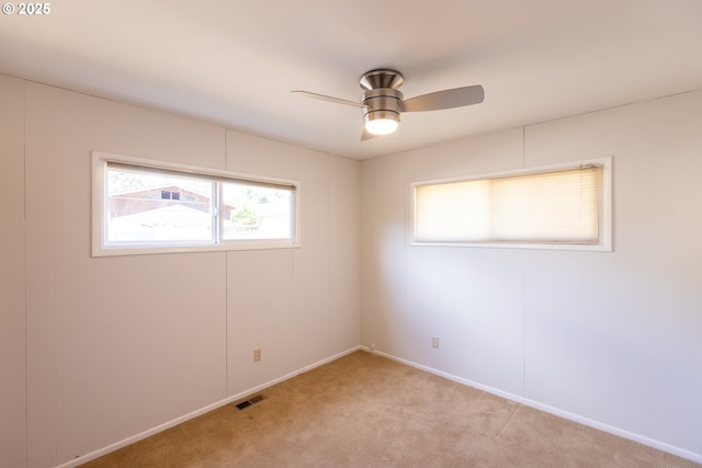 1379 Tucker Rd, Hood River, OR 97031 - empty room with ceiling fan, light colored carpet, and baseboards