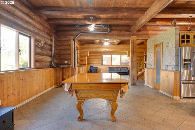 34643 Mountain View Pl NE, Albany, OR 97322 - rec room with wooden ceiling with exposed beams, rustic walls, billiards table, light tile patterned floors, and baseboards