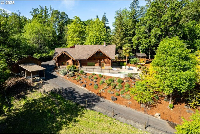 34643 Mountain View Pl NE, Albany, OR 97322 - view of front facade featuring log exterior and an outdoor structure