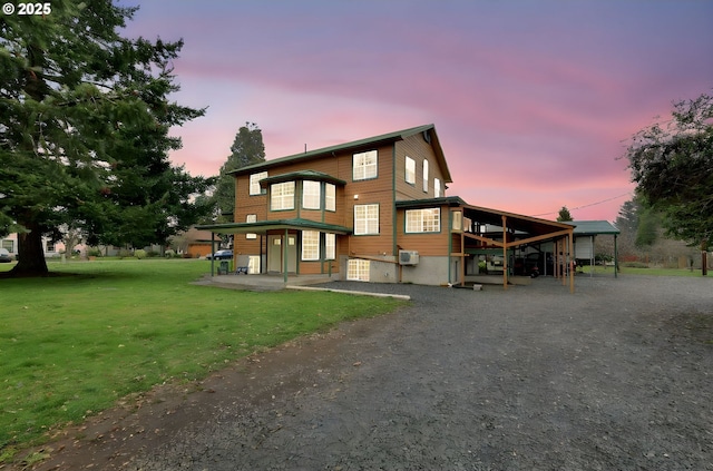 view of front of property with a yard