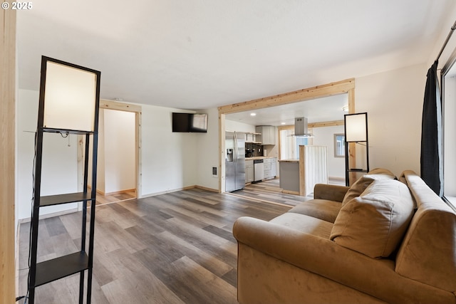 89311 Sutton Lake Dr, Florence, OR 97439 - living area with wood finished floors and baseboards