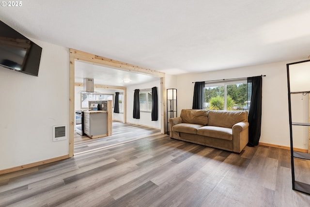 89311 Sutton Lake Dr, Florence, OR 97439 - living room featuring light wood-style floors and baseboards