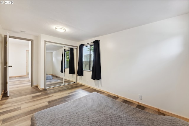 89311 Sutton Lake Dr, Florence, OR 97439 - spare room with wood finished floors and baseboards