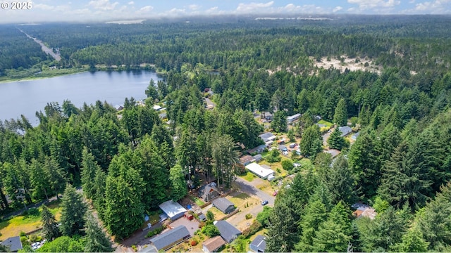 89311 Sutton Lake Dr, Florence, OR 97439 - view of property location with a heavily wooded area and a large body of water