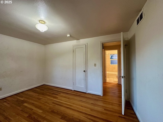 bonus room featuring hardwood / wood-style floors