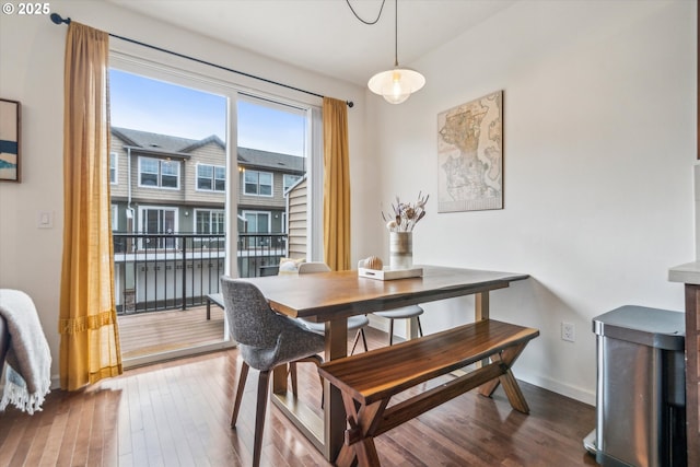 680 NW Falling Waters Ln Unit 105, Portland, OR 97229 - dining room featuring hardwood / wood-style floors and baseboards