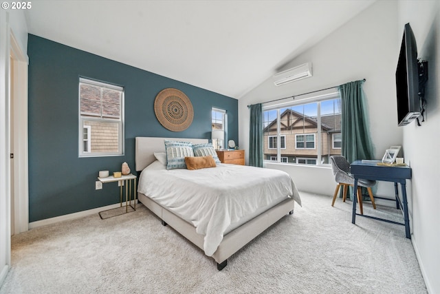 680 NW Falling Waters Ln Unit 105, Portland, OR 97229 - carpeted bedroom featuring a wall unit AC, multiple windows, and lofted ceiling