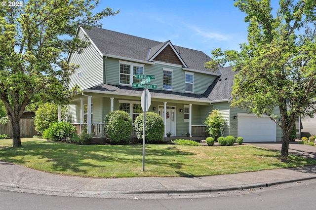 16295 NW Energia St, Portland, OR 97229 - view of front of property featuring covered porch, a garage, driveway, and a shingled roof