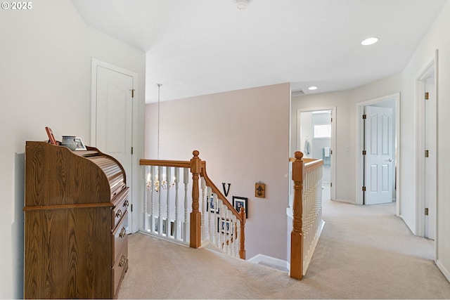 16295 NW Energia St, Portland, OR 97229 - hall with an upstairs landing, light colored carpet, and recessed lighting