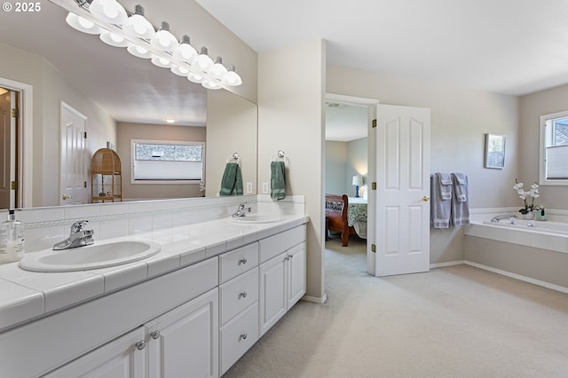 16295 NW Energia St, Portland, OR 97229 - bathroom featuring double vanity, plenty of natural light, a garden tub, and connected bathroom