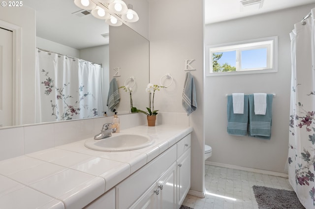 16295 NW Energia St, Portland, OR 97229 - full bath featuring vanity, tile patterned floors, a chandelier, and a shower with shower curtain