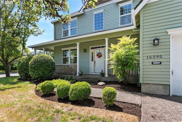 16295 NW Energia St, Portland, OR 97229 - view of front of property with a porch and a garage