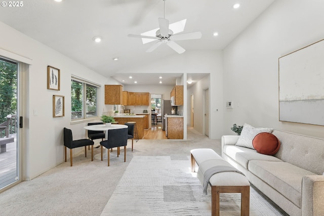 12028 SW Lesser Rd, Portland, OR 97219 - living area with light carpet, recessed lighting, vaulted ceiling, and a ceiling fan