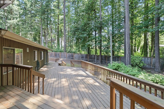 12028 SW Lesser Rd, Portland, OR 97219 - deck with a fenced backyard and view of scattered trees