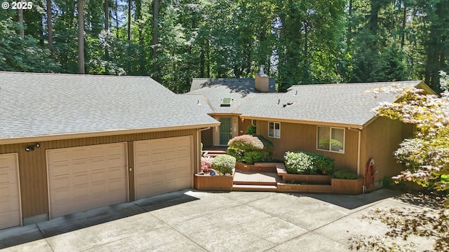 12028 SW Lesser Rd, Portland, OR 97219 - view of front of property with a chimney, a shingled roof, and driveway