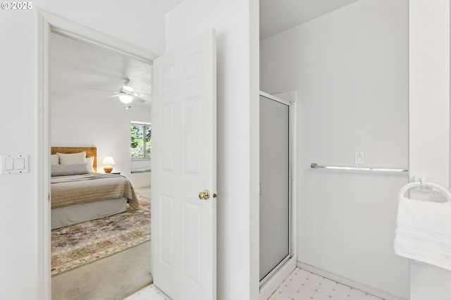 12028 SW Lesser Rd, Portland, OR 97219 - ensuite bathroom featuring a stall shower, a ceiling fan, and tile patterned floors