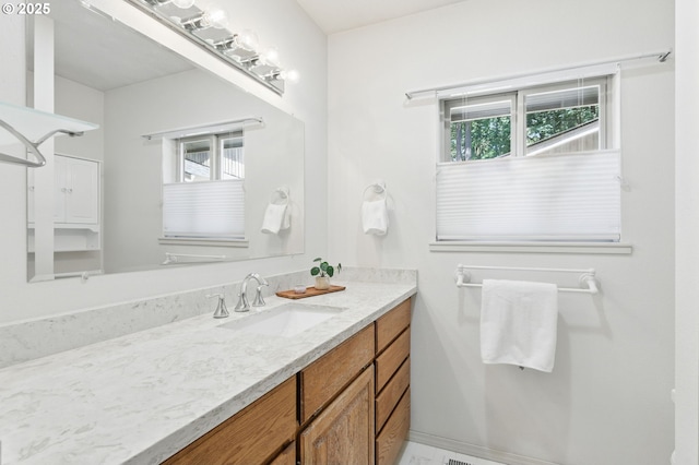 12028 SW Lesser Rd, Portland, OR 97219 - bathroom featuring vanity and healthy amount of natural light