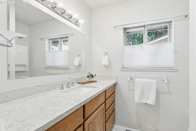12028 SW Lesser Rd, Portland, OR 97219 - bathroom with vanity and healthy amount of natural light