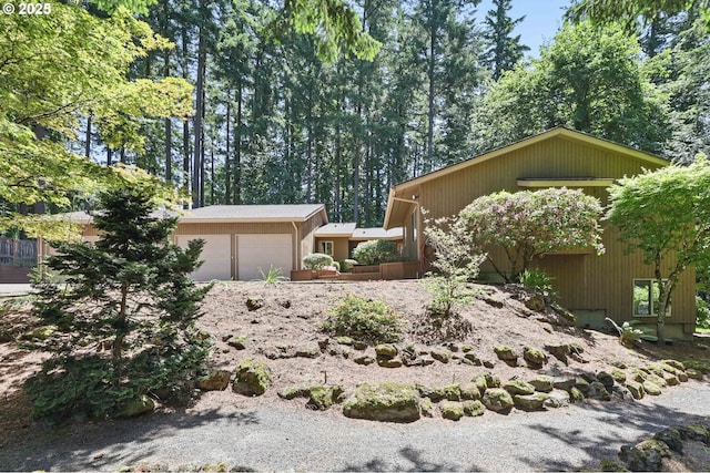12028 SW Lesser Rd, Portland, OR 97219 - mid-century home featuring an attached garage