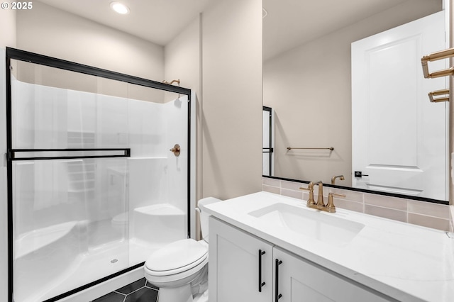 full bathroom with a shower stall, toilet, vanity, and recessed lighting