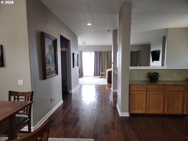 corridor with dark wood-type flooring