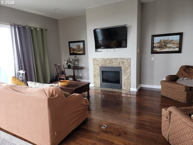 living room featuring dark hardwood / wood-style flooring