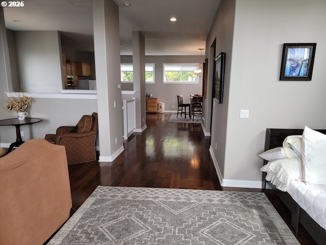 corridor featuring dark hardwood / wood-style floors