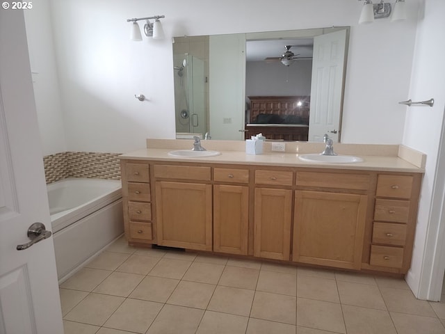 bathroom with vanity, tile patterned floors, ceiling fan, and separate shower and tub