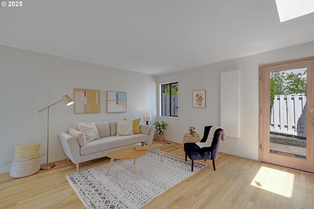 17141 Hofer Ct, Lake Oswego, OR 97034 - living area with wood finished floors and a skylight