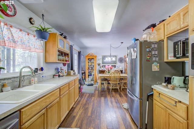 590 Fairchild St, Canyonville, OR 97417 - kitchen featuring glass insert cabinets, a sink, stainless steel appliances, light countertops, and dark wood-type flooring