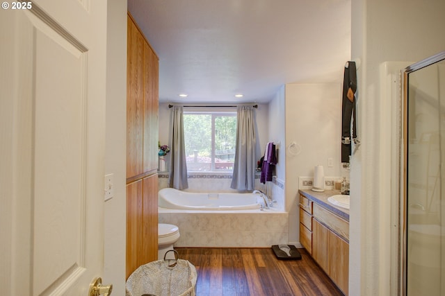590 Fairchild St, Canyonville, OR 97417 - full bath with a shower stall, a garden tub, recessed lighting, wood finished floors, and vanity