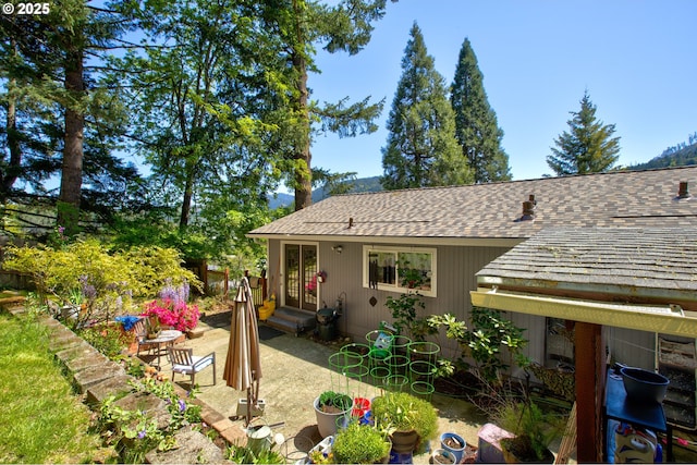 590 Fairchild St, Canyonville, OR 97417 - back of property featuring a patio area and roof with shingles
