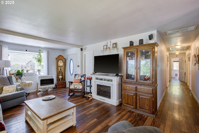 590 Fairchild St, Canyonville, OR 97417 - living room with dark wood-style flooring, visible vents, plenty of natural light, and a high end fireplace