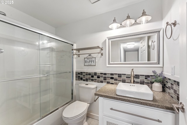 17948 SW Robert Ln, Beaverton, OR 97078 - bathroom with vanity, toilet, shower / bath combination with glass door, and tile walls