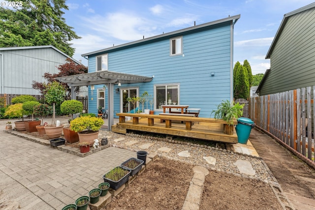 17948 SW Robert Ln, Beaverton, OR 97078 - back of house with a pergola, a wooden deck, and a patio