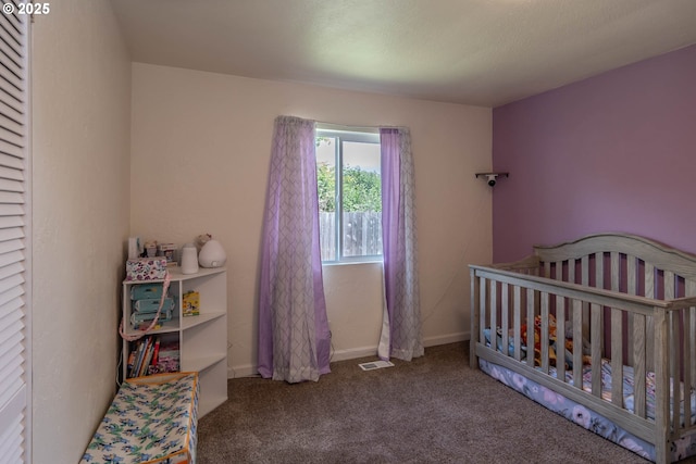 4033 Hanna St, Roseburg, OR 97471 - bedroom with carpet floors, a crib, and baseboards