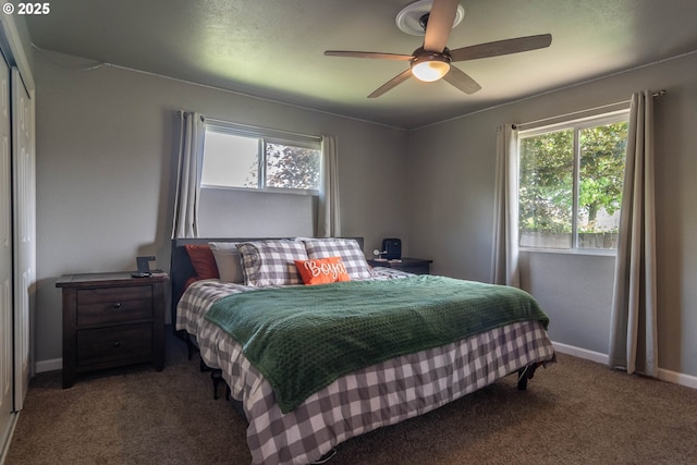 4033 Hanna St, Roseburg, OR 97471 - carpeted bedroom featuring multiple windows, baseboards, and ceiling fan